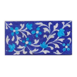 Turquoise flower and blue tile. Turquoise flower and blue tile.