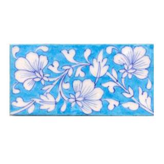White flower and turqouise tile White flower and turqouise tile