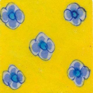 Blue flowers on yellow tile Blue flowers on yellow tile