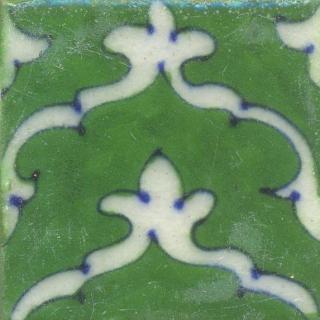 White Pattern On Green Base Tile
