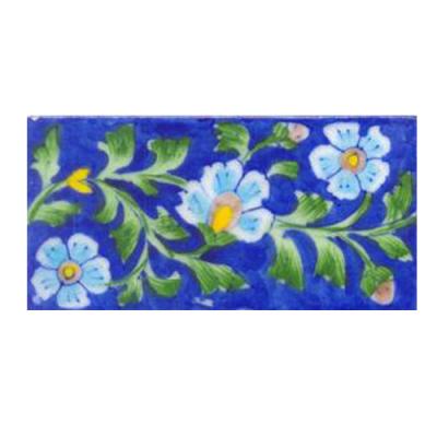 Three turqouise flower and blue tile Three turqouise flower and blue tile