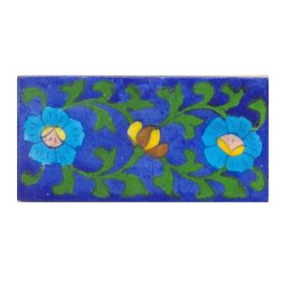 Two turqouise flower and green leaves with blue tile Two turqouise flower and green leaves with blue tile