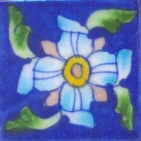 Blue tile with turquoise, pink and green flower Blue tile with turquoise, pink and green flower