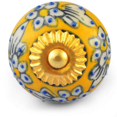 White Flowers and Leaves on Yellow and White Ceramic knob White Flowers and Leaves on Yellow and White Ceramic knob