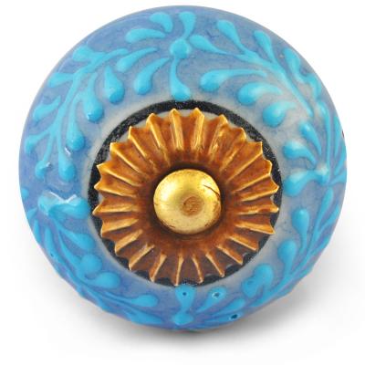 Turquoise Embossed design on Light Blue and White Base Ceramic knob