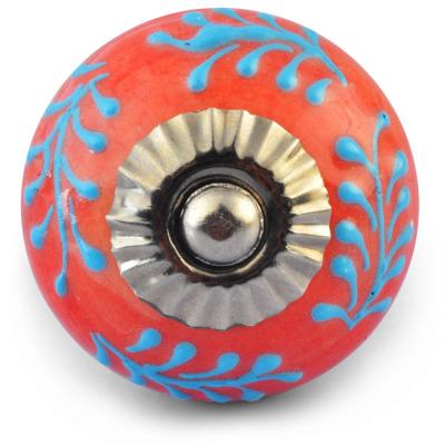 Turquoise Embossed design on Red Ceramic knob Turquoise Embossed design on Red Ceramic knob