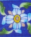 Blue tile with turquoise, pink and green flower