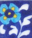 Turquoise and Yellow flower With White Leaves On Blue Base Tile