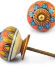 Turquoise Flower and Yellow Leaves on Orange and White Ceramic knob